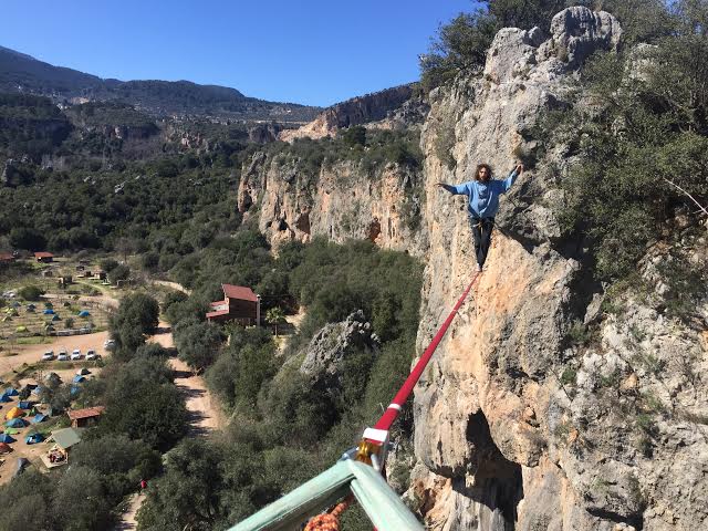 Here's total trust. That's Ari walking on a highline in Turkey. He's got a harness on. But still.